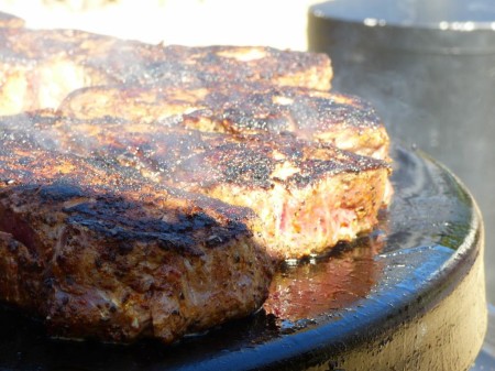 Sizzling Ribeye Steaks on the EVO Grill
